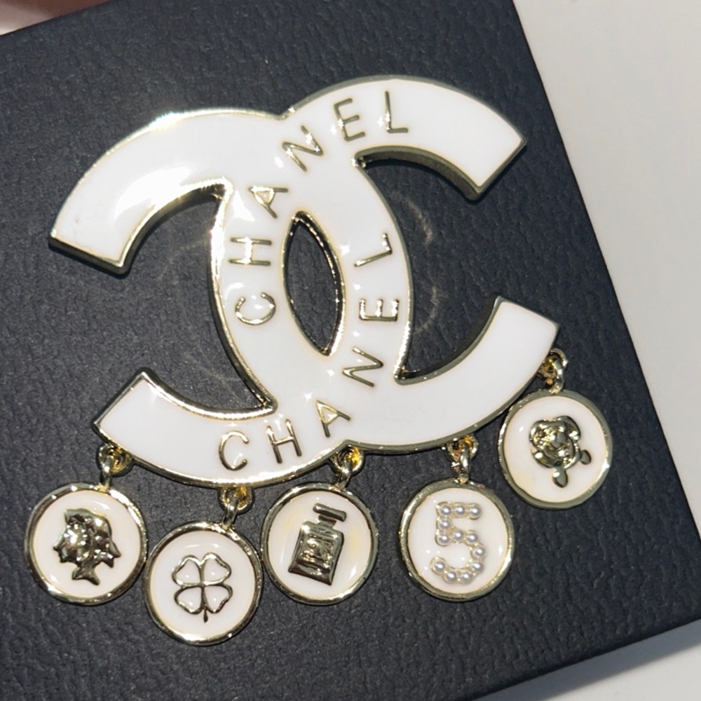 CHANELLY Gold and Cream Logo Brooch - Picture 2 of 6
